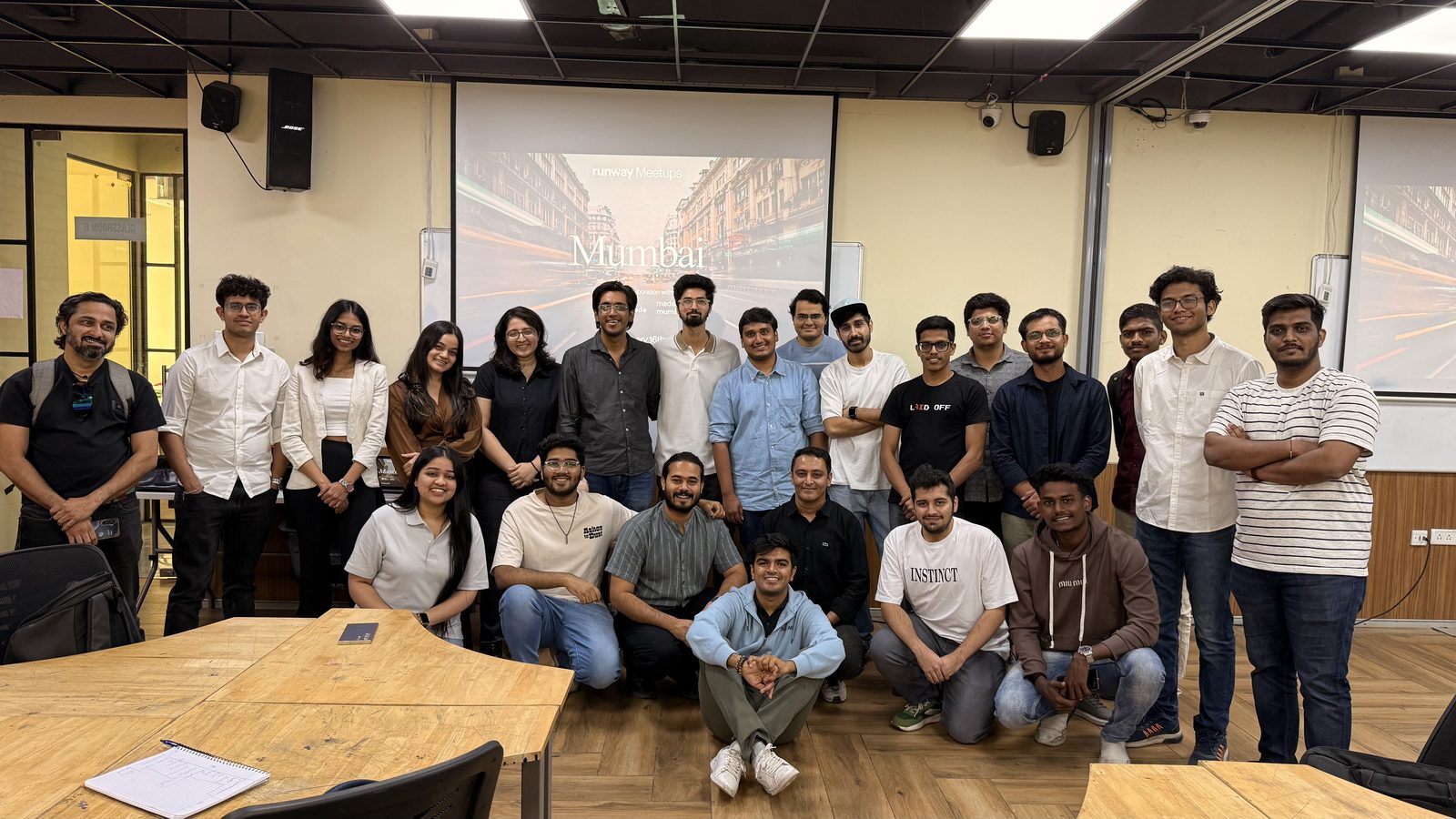 the full group at the runway meetup in mumbai, in front of a slide reading runway meetups mumbai